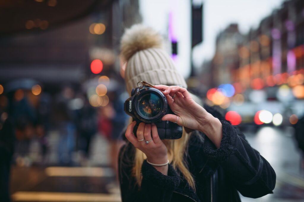 A woman with a camera